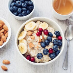 Bowl of oatmeal with almonds and fruit