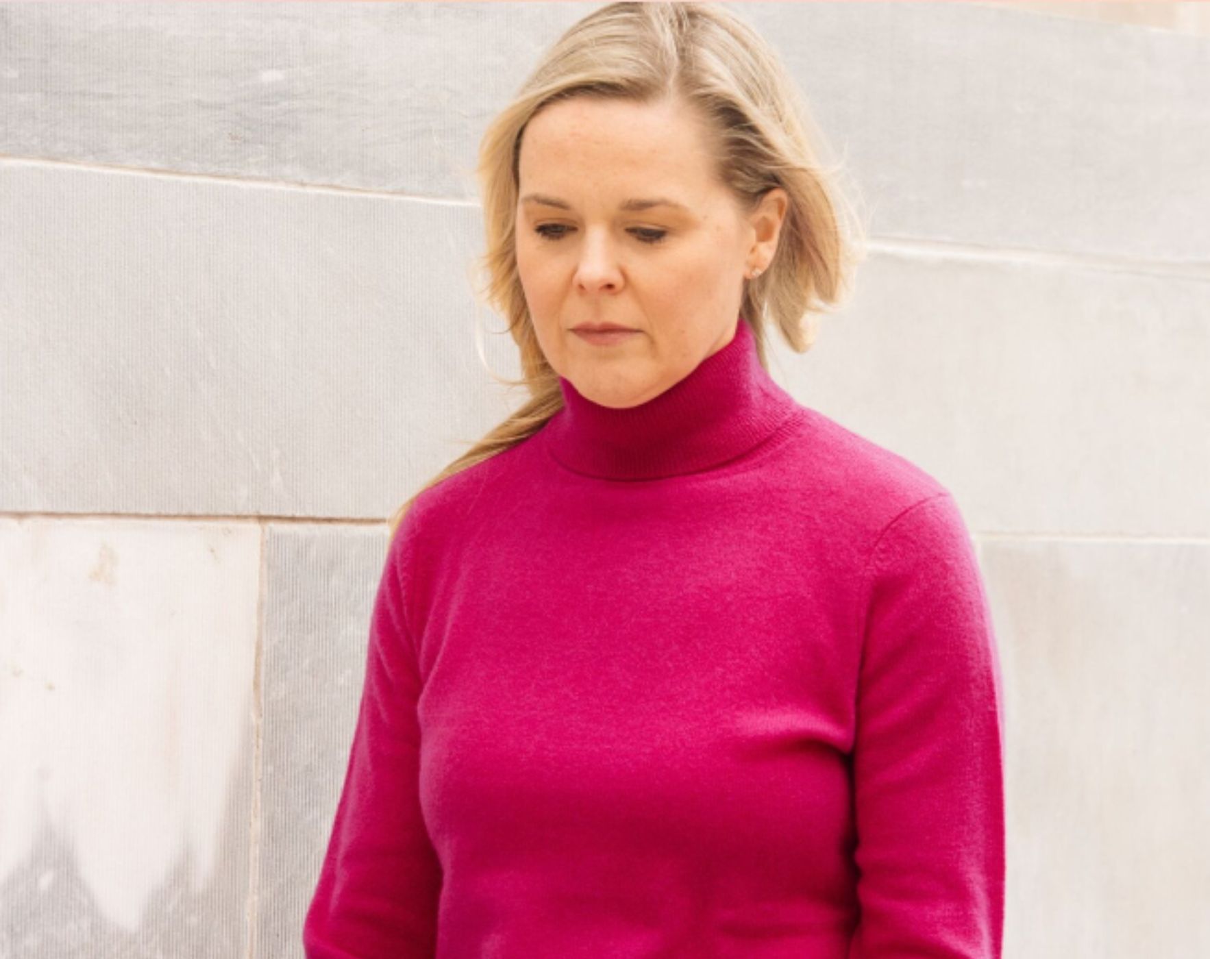 A person walking through a dense fog, visually representing the often invisible and unpredictable symptoms like fatigue and brain fog associated with Multiple Sclerosis.
