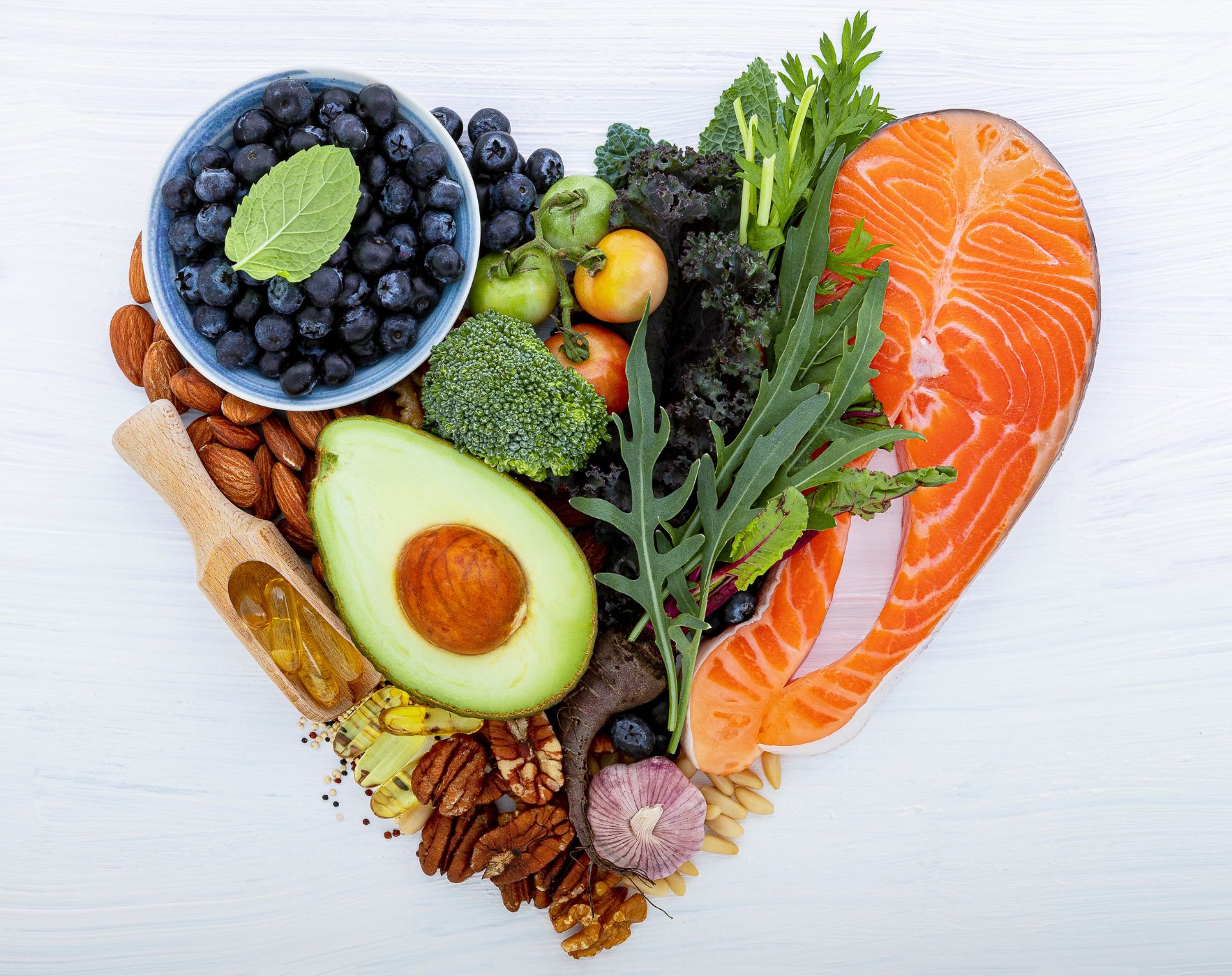 A plate filled with colorful vegetables, symbolizing three simple steps to adopting an MS-friendly diet for better health and symptom management.